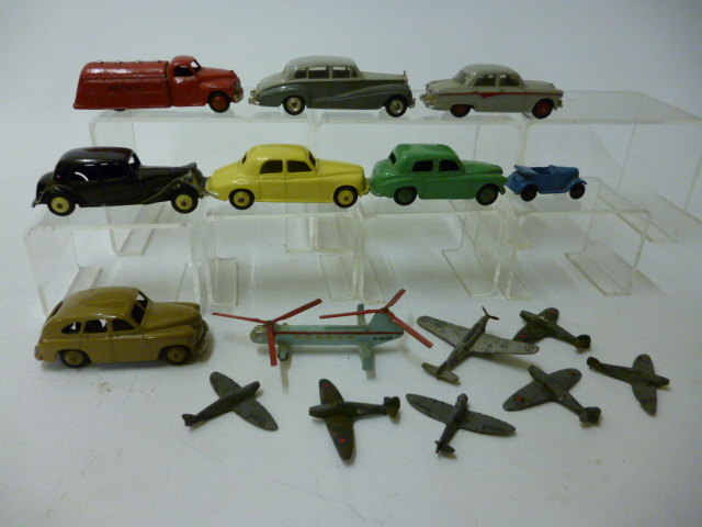 Appraisal: Seven various early Dinky cars and a d Petrol tank