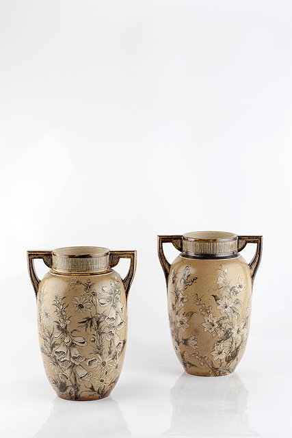 Appraisal: Martin BrothersPair of vases twin handled incised and painted with