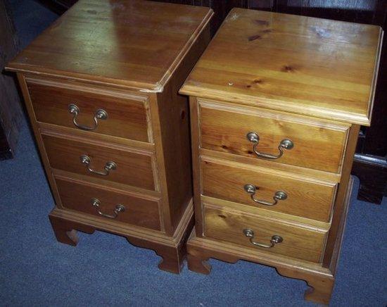 Appraisal: A pair of pine pedestal chests each fitted three drawers