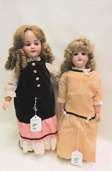 Appraisal: TWO GERMAN BISQUE SOCKET HEAD DOLLS Simon Halbig having blue