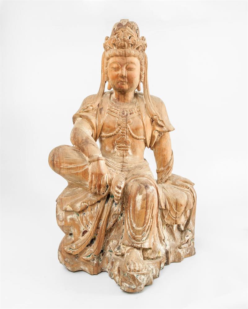 Appraisal: MING STYLE CARVED WOOD FIGURE OF A BODHISATTVA Modeled seated