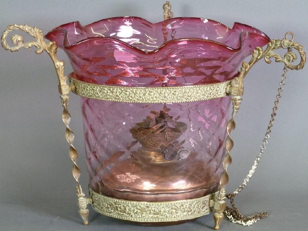 Appraisal: EDWARDIAN EMBOSSED BRASS FRAMED AND CRANBERRY TINTED GLASS CEILING OIL