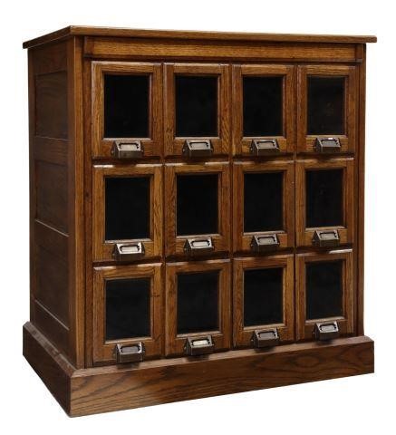 Appraisal: Oak card catalog style cabinet late th c twelve drawers