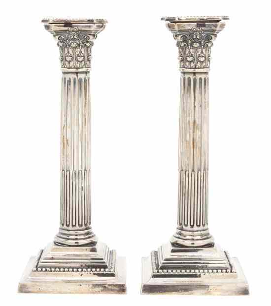 Appraisal: A Pair of American Silverplate Candlesticks Gorham each of columnar