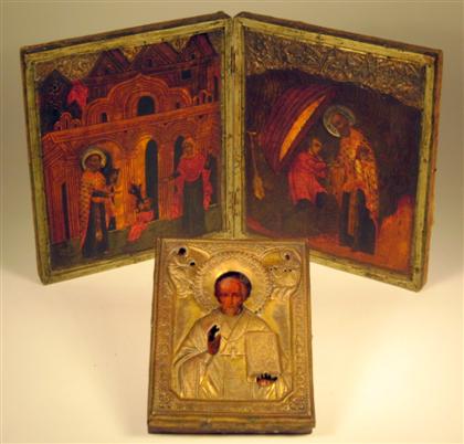 Appraisal: Two Russian gilt metal and painted wood icons late th