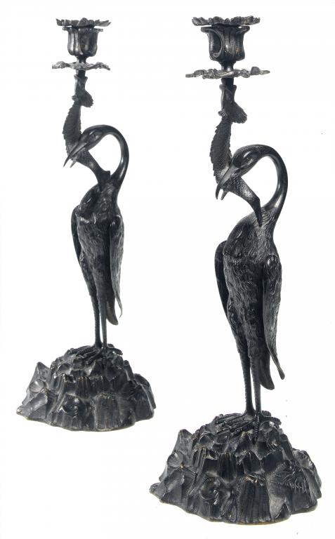 Appraisal: A PAIR OF VICTORIAN BRONZE STORK CANDLESTICKS the bird perched