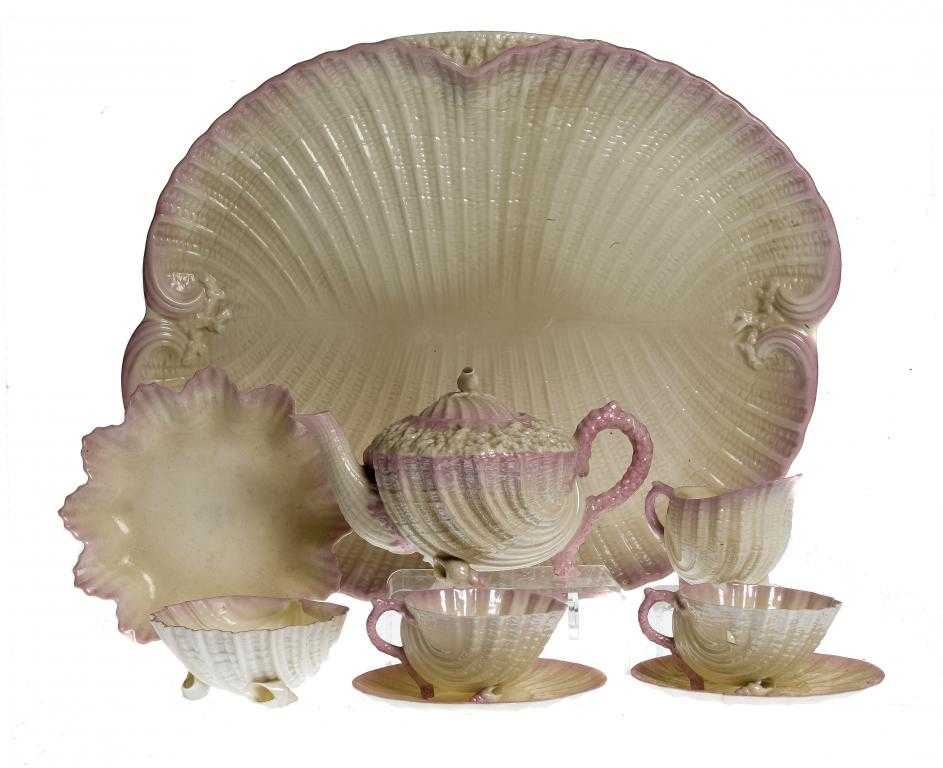 Appraisal: A BELLEEK NEPTUNE CABARET SERVICE with shaded pink border the