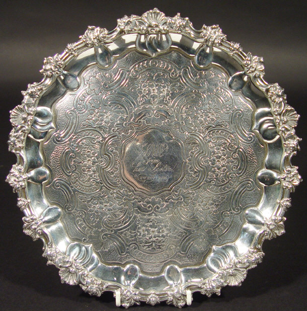 Appraisal: Georgian silver three footed salver embossed and chased with flowers