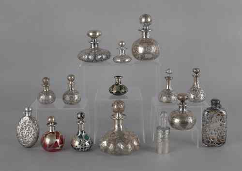 Appraisal: Fifteen silver overlay glass bottles tallest -