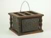 Appraisal: FOOT WARMER - Turned dark wood and pierced tin in