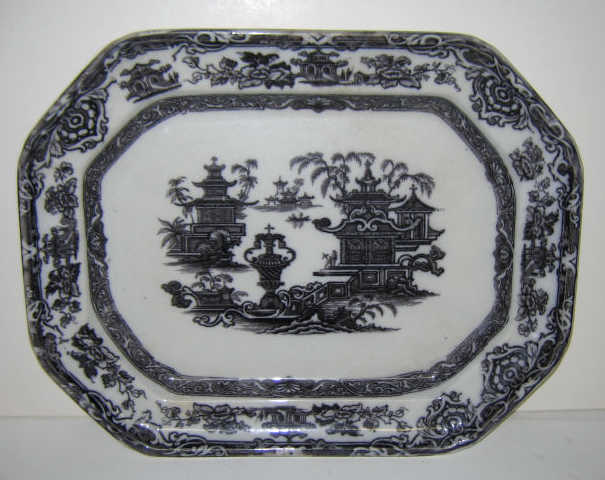 Appraisal: PODMORE WALKER CO TUNSTALL ENGLAND Flow blue earthenware octagonal platter