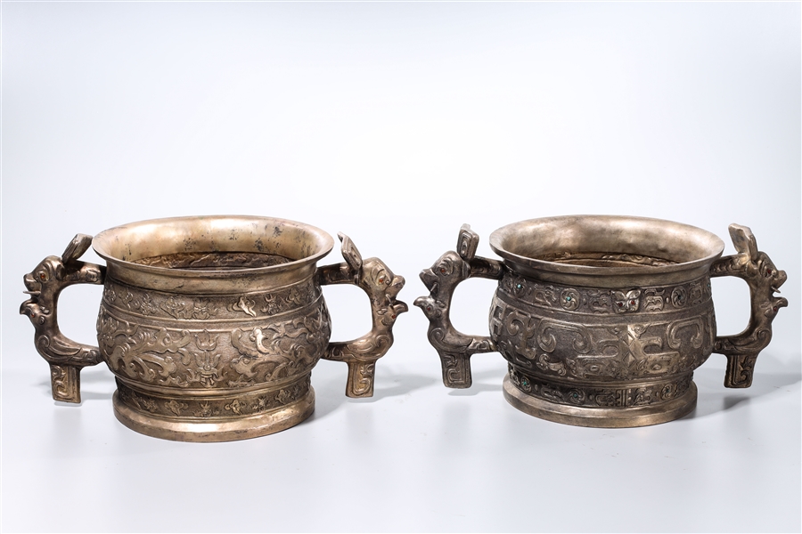 Appraisal: Two Chinese archaistic metal censers with beast-form handles x x