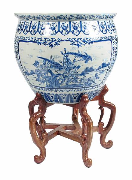 Appraisal: A massive Chinese blue and white porcelain jardiniere on stand