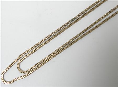 Appraisal: An Edwardian ct gold long chain composed of star pierced