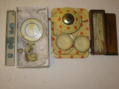 Appraisal: A quantity of doll's miniature tea ware in tin plate