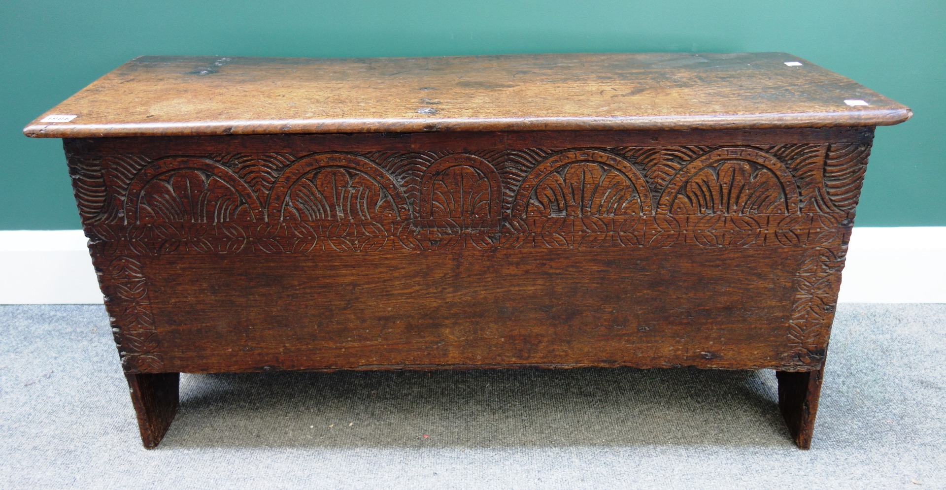 Appraisal: A th century oak coffer of plank construction with chip