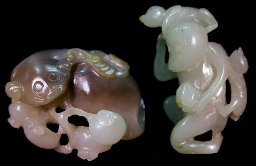 Appraisal: TWO CHINESE JADE CARVINGS the first of good white tone