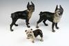 Appraisal: DOOR STOPS - Circa lot of three cast iron dog