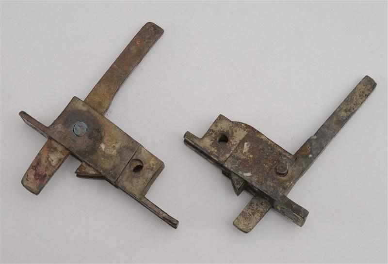 Appraisal: TWO WARRING STATES HAN DYNASTY ARCHAIC BRONZE CROSSBOW MECHANISMS Each