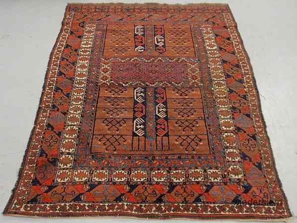 Appraisal: Oriental center hall carpet with geometric patterns and red field