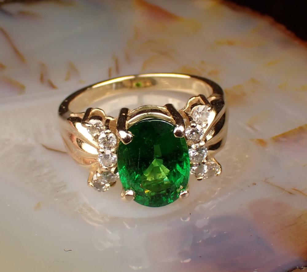 Appraisal: TSAVORITE DIAMOND AND FOURTEEN KARAT GOLD RING WITH APPRAISAL The