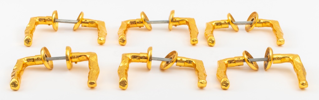 Appraisal: GIACOMETTI MANNER GOLD-TONE METAL DOOR HANDLES Five gold-tone metal door