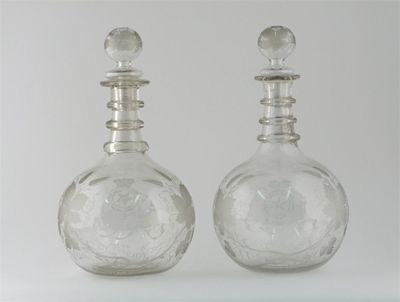 Appraisal: A massive pair of decanters and stoppers each to hold