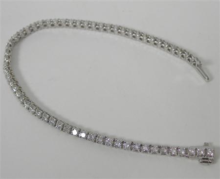 Appraisal: A modern diamond line bracelet claw set with uniform round