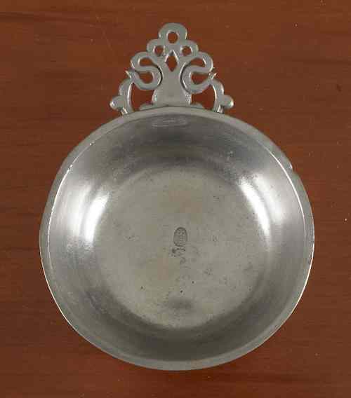 Appraisal: Hartford Connecticut pewter porringer ca bearing the touch of Samuel