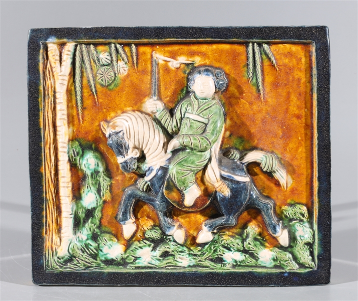 Appraisal: Chinese sancai glazed ceramic plaque with horse and rider in