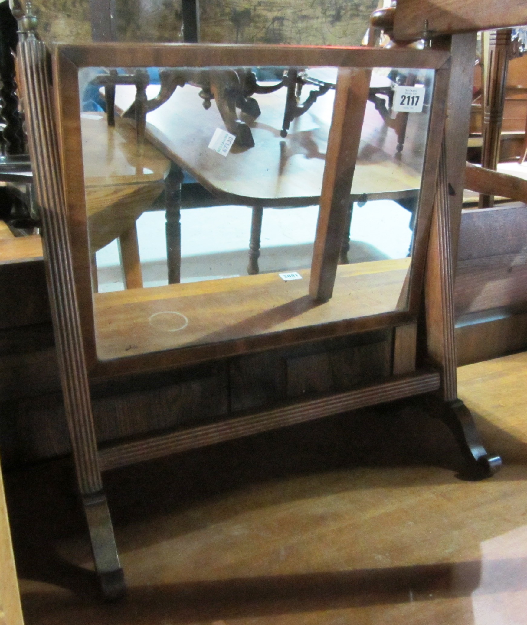 Appraisal: An oak swing frame mirror and leather case