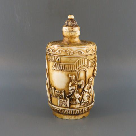 Appraisal: Chinese Carved Ivory Snuff Bottle scenes with villagers excellent