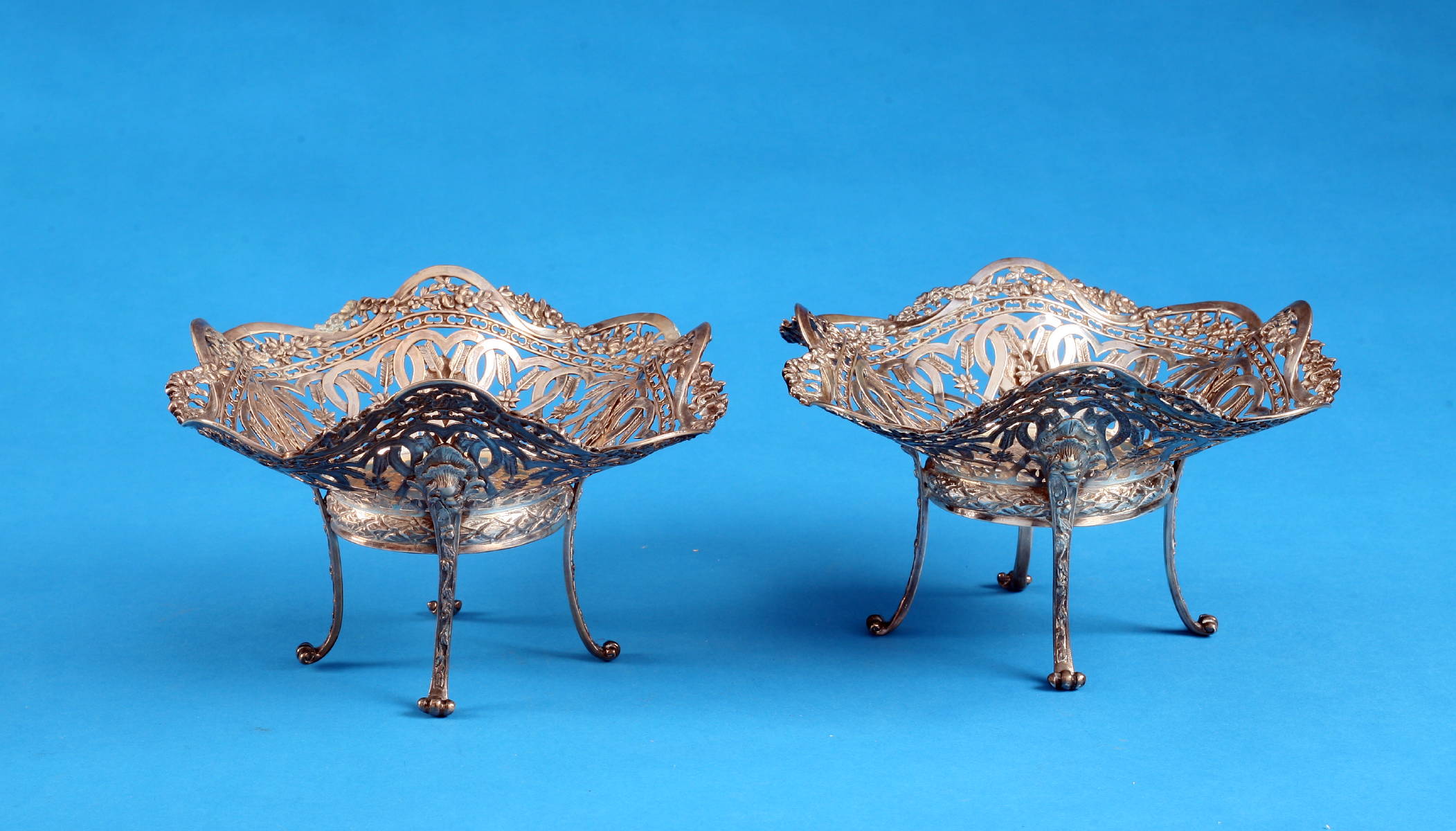 Appraisal: PAIR OF CONTINENTAL SILVER RETICULATED BOWLS NINETEENTH CENTURY Each engraved