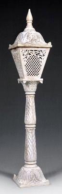 Appraisal: Carved marble torchere floral shaped top with turned finial above