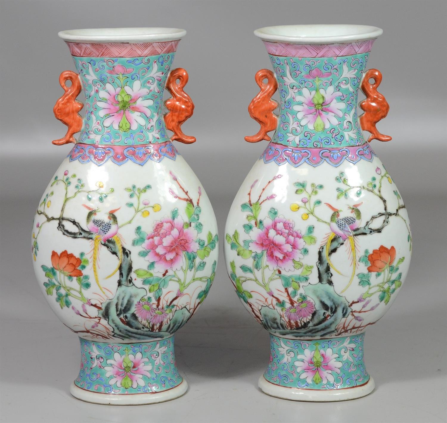 Appraisal: Pair of Chinese Famille Rose decorated porcelain vases with exotic