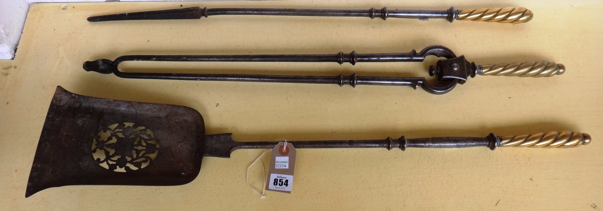 Appraisal: A set of three English steel and brass mounted fire