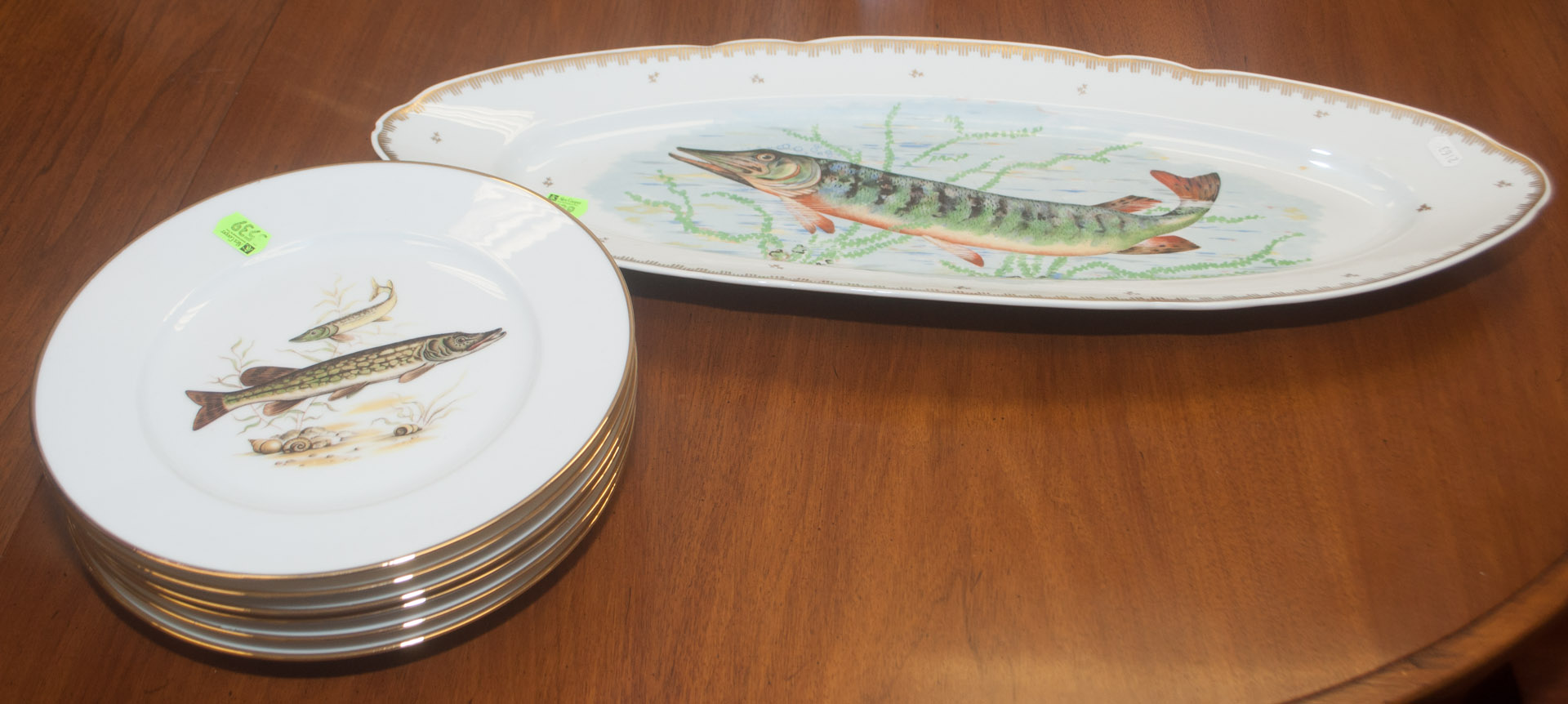 Appraisal: French and German gar decorated plates