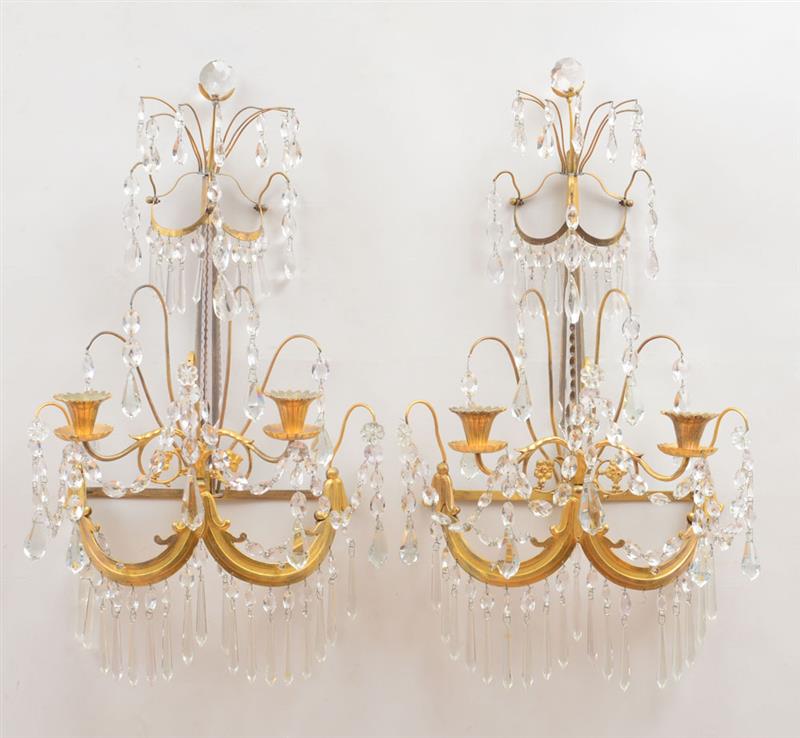 Appraisal: PAIR OF REGENCY GILT-METAL AND CUT-GLASS TWO-LIGHT WALL SCONCES Each