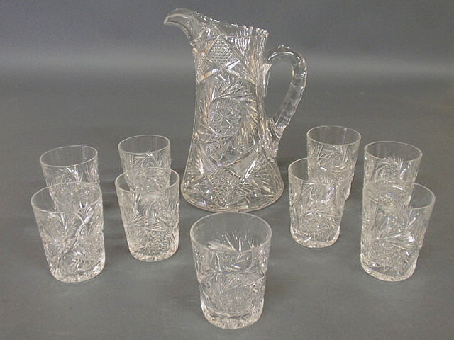 Appraisal: Cut glass water pitcher h and nine tumblers h