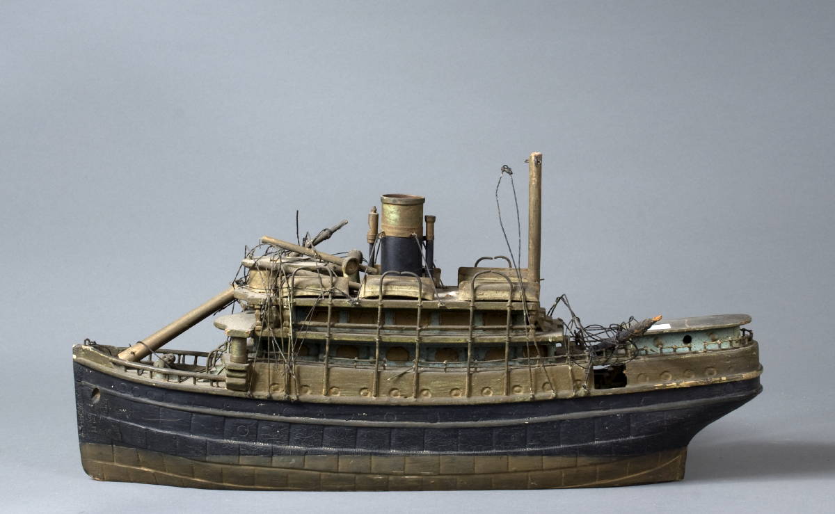 Appraisal: CARVED AND PAINTED MODEL OF A STEAMSHIP The wood hull