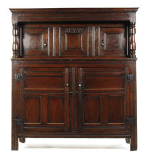 Appraisal: A George I oak court cupboard dated probably Welsh having