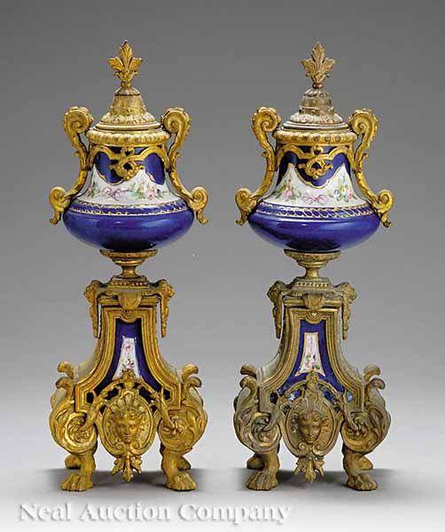 Appraisal: A Pair of French Porcelain Gilt Bronze-Mounted Garniture Urns in