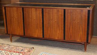 Appraisal: Mid Century walnut buffet Mid Century walnut buffet having an