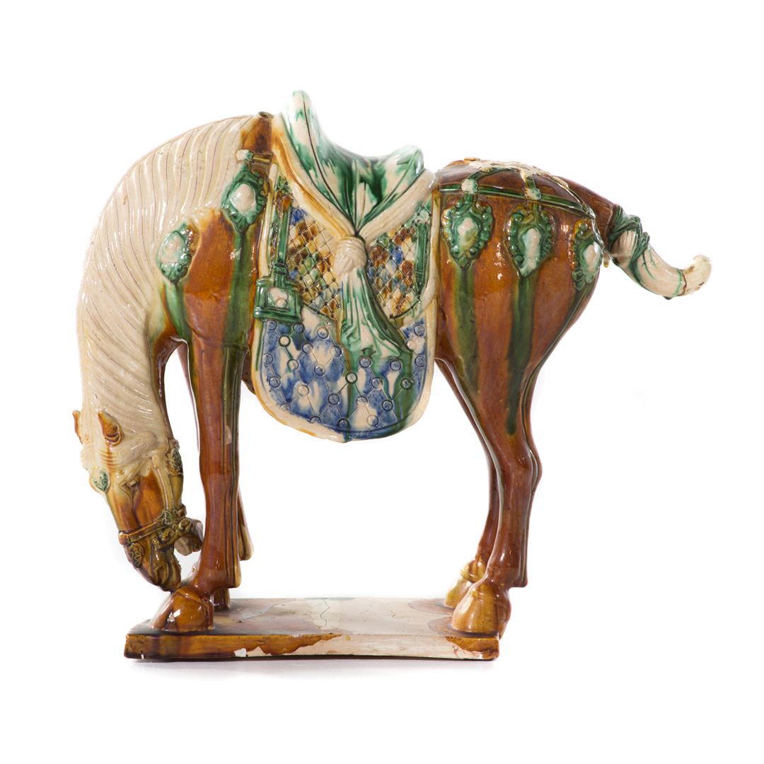 Appraisal: Chinese Tang style terracotta horse in H Condition Repaired tail