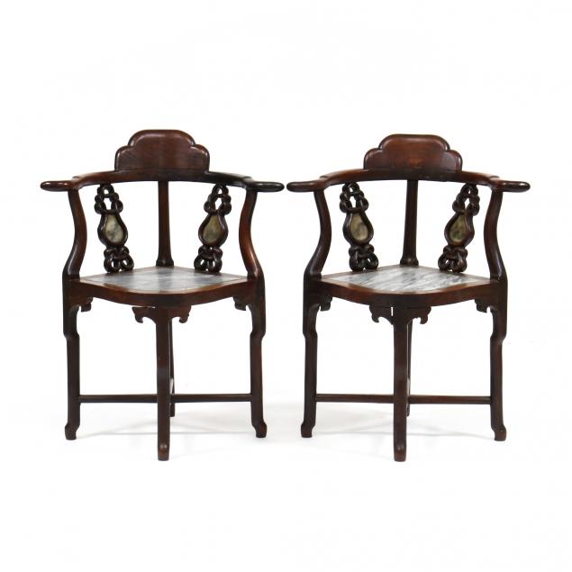 Appraisal: A PAIR OF CHINESE CARVED ROSEWOOD CORNER CHAIRS INLAID WITH