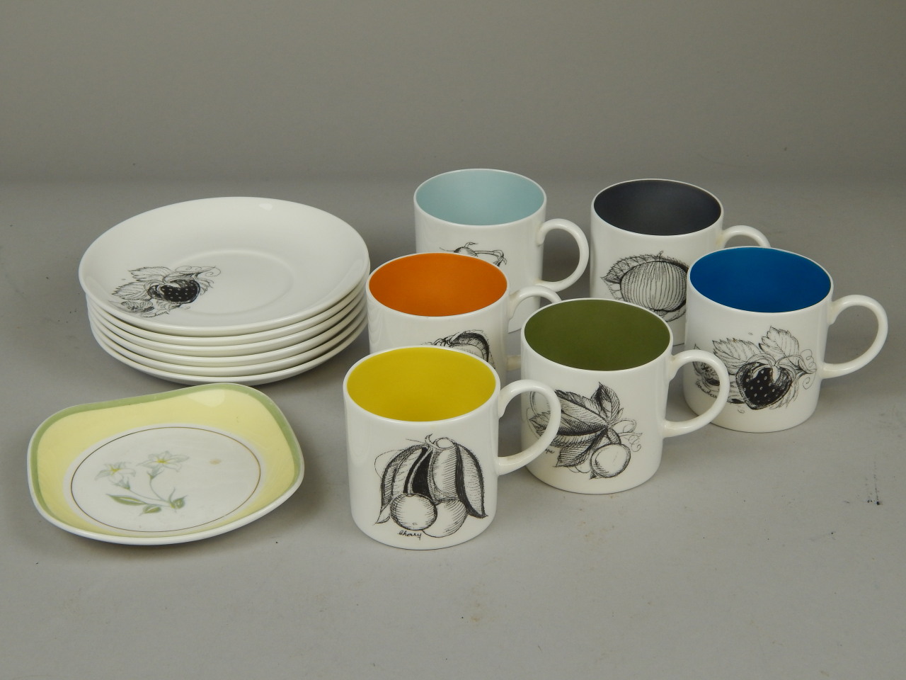 Appraisal: A Susie Cooper design bone china harlequin coffee set each