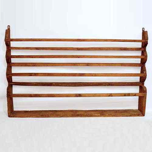 Appraisal: A Scandinavian Pine Hanging Plate Rack th century having three