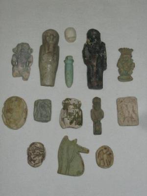 Appraisal: FOURTEEN VARIOUS EGYPTIAN STONE AMULETS modelled as figures animals and