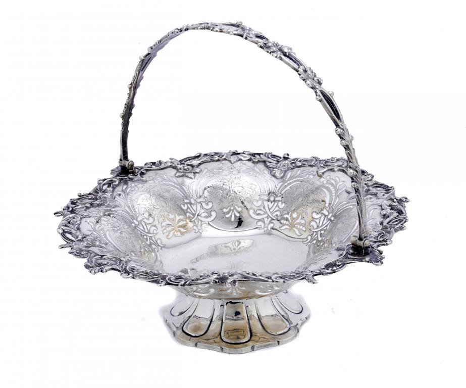 Appraisal: A VICTORIAN CAKE BASKET of lobed circular shape engraved with