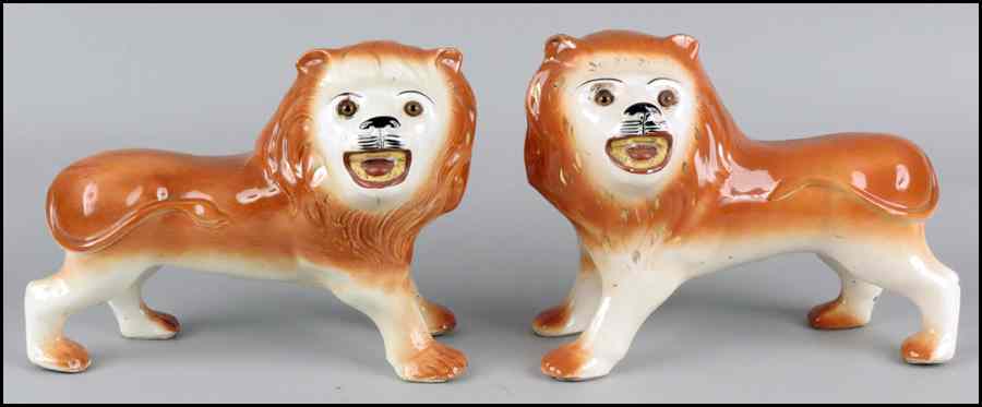 Appraisal: PAIR OF STAFFORDSHIRE LIONS th century Condition No Specific Condition